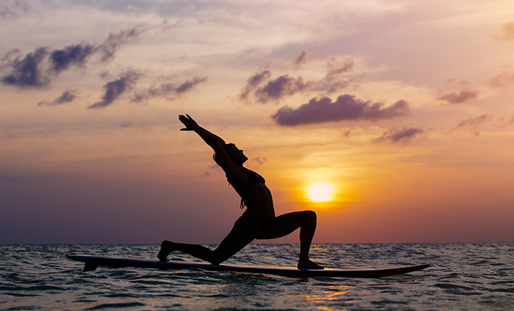 SUP yoga o paddle Surf yoga